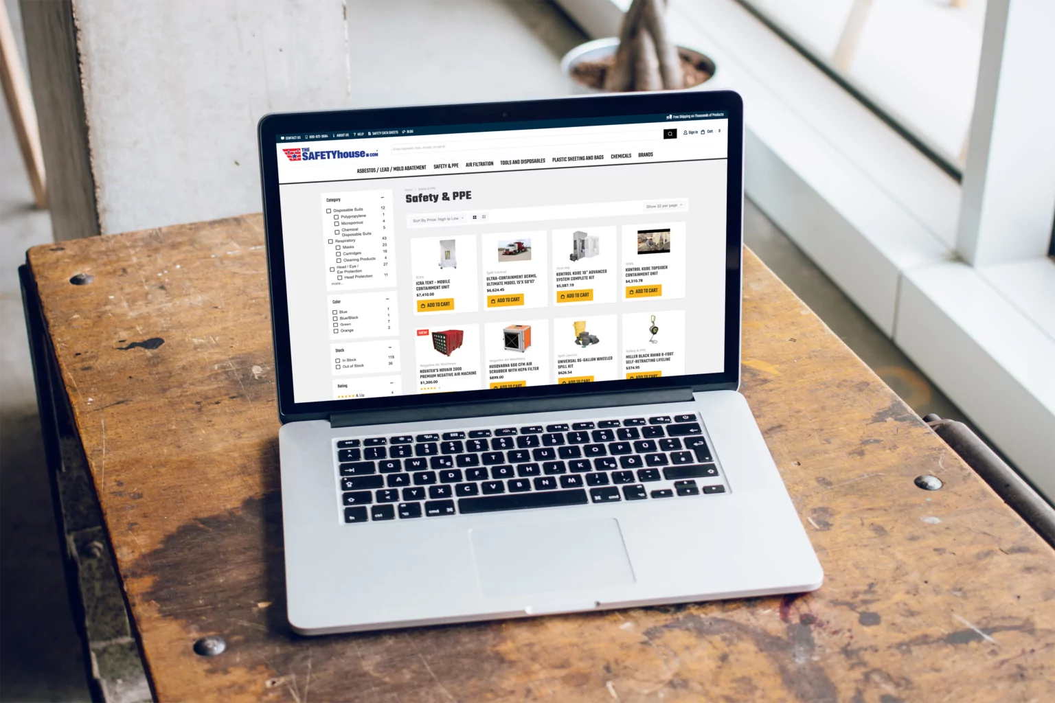 The Safety House redesigned e-commerce website displayed on a laptop